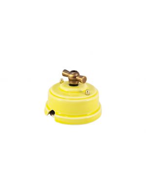 Выключатель (переключатель) фарфоровый поворотный одноклавишный проходной, цвет giallo (желтый), ручка бронза