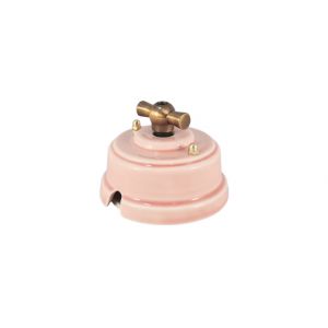 Выключатель (переключатель) фарфоровый поворотный одноклавишный проходной, цвет rosa (розовый), ручка бронза