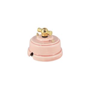 Выключатель (переключатель) фарфоровый поворотный одноклавишный проходной, цвет rosa (розовый), ручка золото